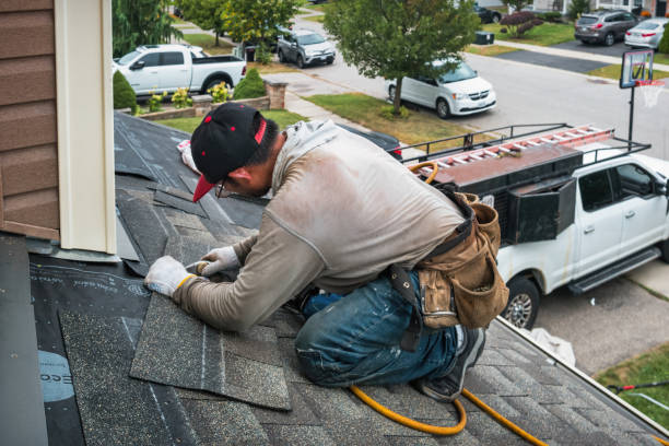 Professional Storm Damage Roof Repair technician working in Barton, MD